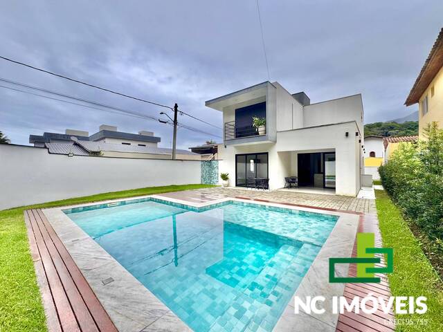 #521 - Casa em condomínio para Venda em Caraguatatuba - SP