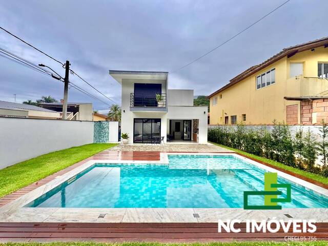 #521 - Casa em condomínio para Venda em Caraguatatuba - SP